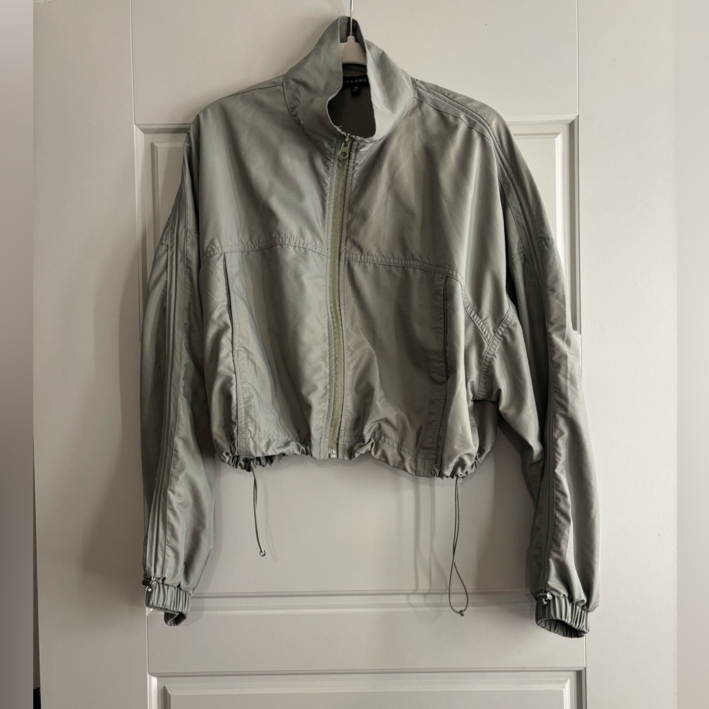 Sage green nylon cropped jacket.